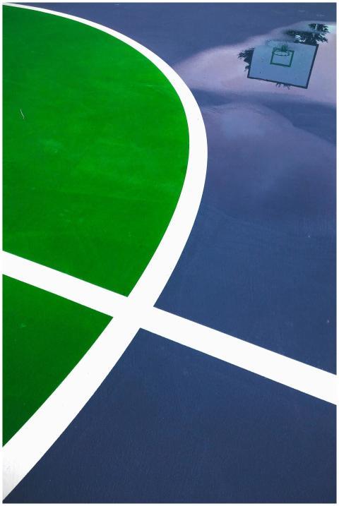 Dynamic close-up of a vibrant basketball court wit