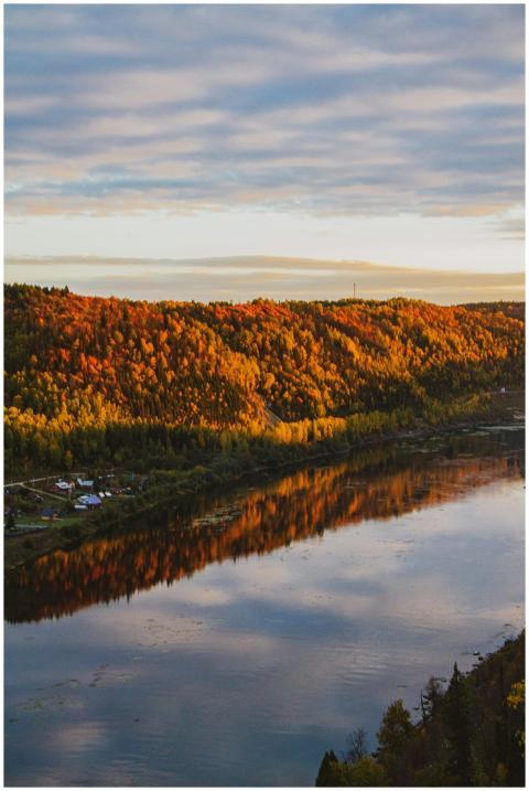 Captivating autumn river landscape with vibrant re