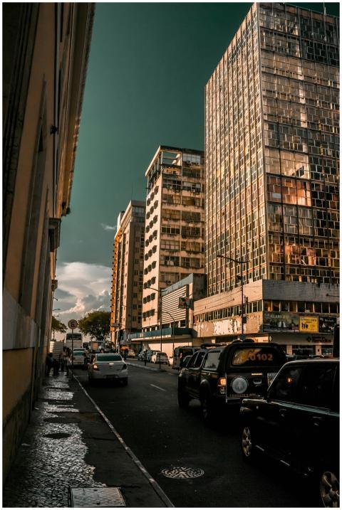 A vibrant city street scene with towering skyscrap