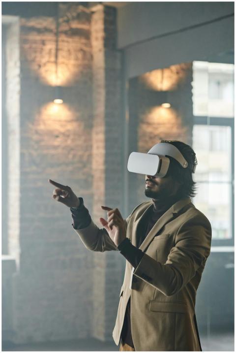 Adult male using a virtual reality headset in an i