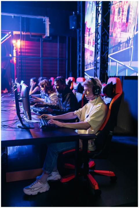 A team of gamers immersed in an e-sports competiti