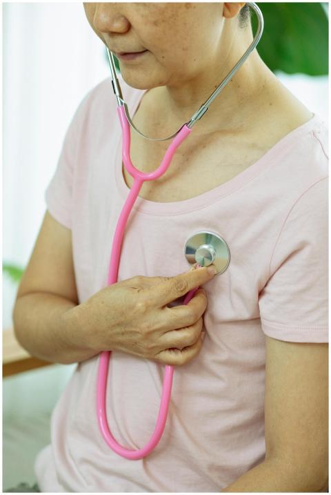 Crop unrecognizable serious middle age female in c