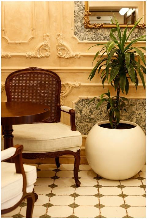 Elegant vintage styled room with a classic armchai