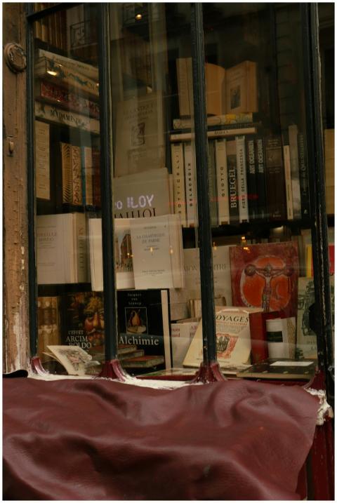Explore the charming Parisian bookshop window fill