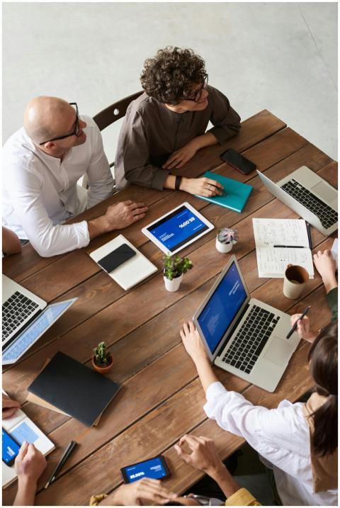 High angle view of a diverse team in a modern offi