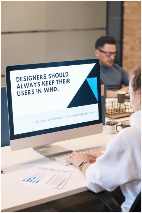 A focused designer works on a user-centric project