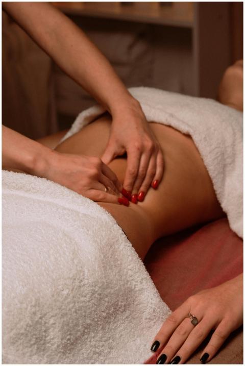 Close-up of therapist giving a soothing massage, c