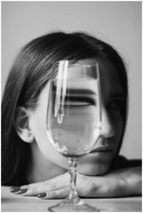 Artistic black and white portrait with a woman's f