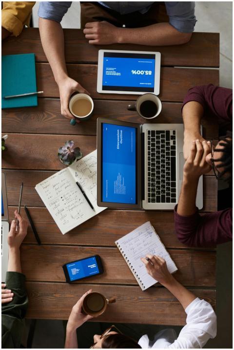 Group of coworkers discussing business strategies