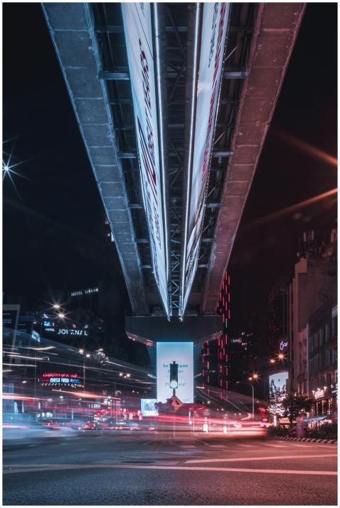 Dynamic night view of Kuala Lumpur cityscape with