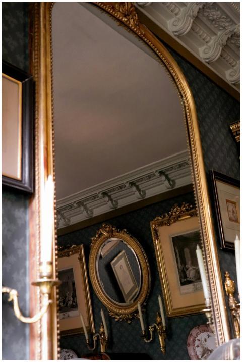 Luxurious Parisian room with ornate mirror and cla