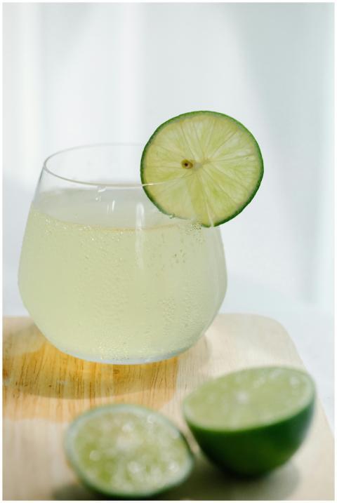 A close-up of refreshing lime juice in a glass cup