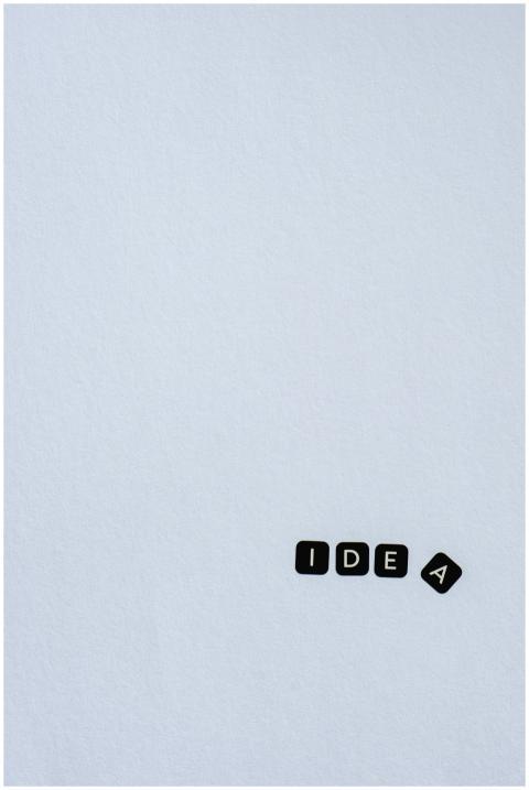 Minimalist design with the word 'Idea' on a light