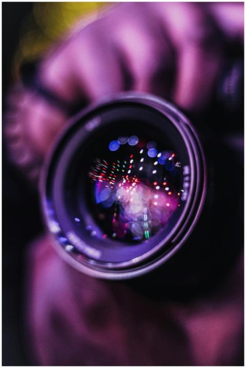 Vibrant reflections in a camera lens; an artistic