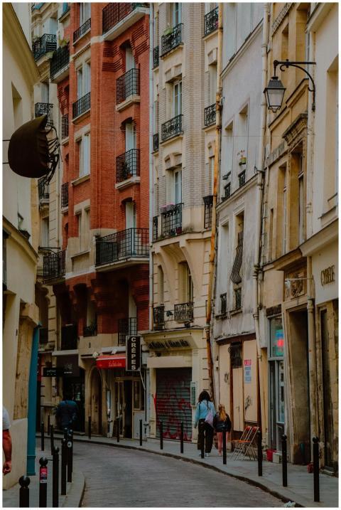 A picturesque street in Paris's Marais district fe
