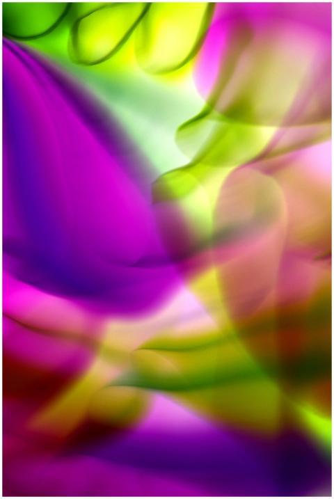 Dynamic abstract image with vibrant waves of green