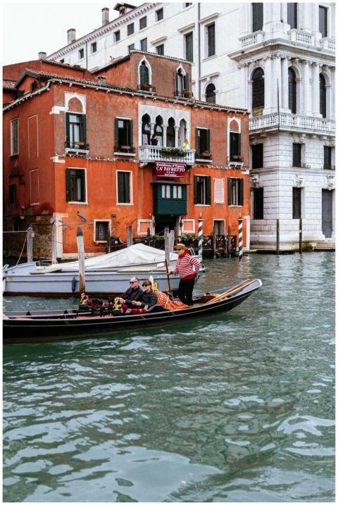 A picturesque gondola ride in Venice's serene cana