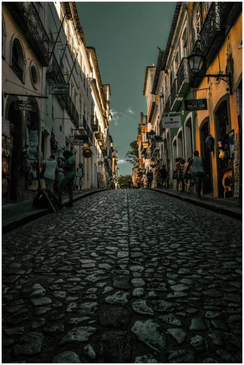 Explore historic cobblestone streets lined with li