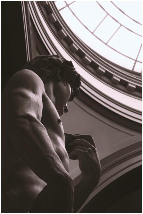 A captivating low angle view of a Renaissance scul