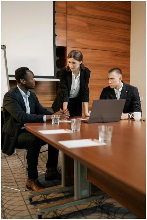 Professional team discussing projects in a modern