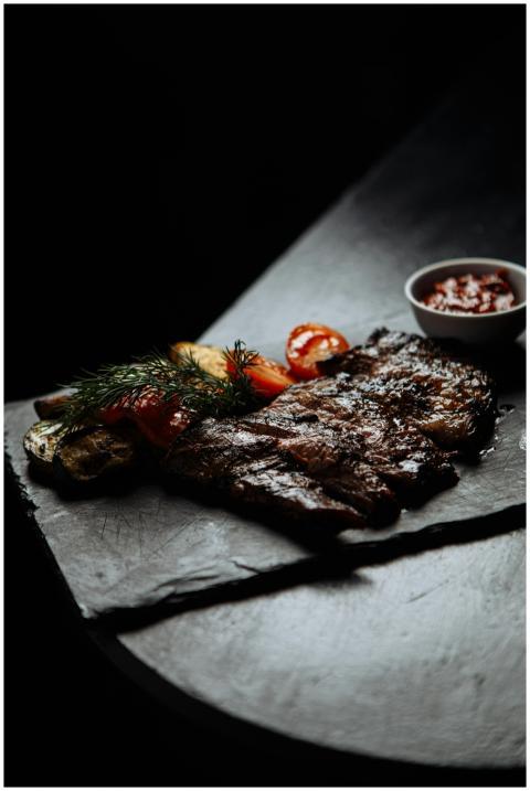 Succulent grilled steak with roasted veggies and s