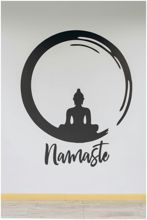 Minimalist wall art featuring a meditation silhoue