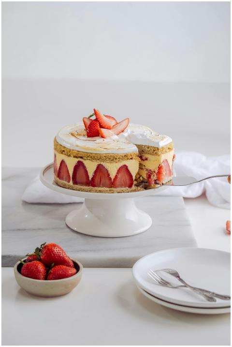 Delightful strawberry butter cake displayed on a c