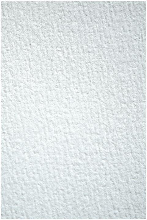Close-up of a white textured surface suitable for