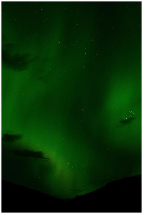 A mesmerizing view of the aurora borealis illumina