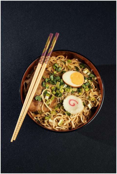 Flavorful ramen noodles with toppings served in a