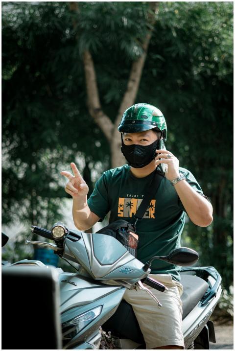 Man Scooter Making Peace