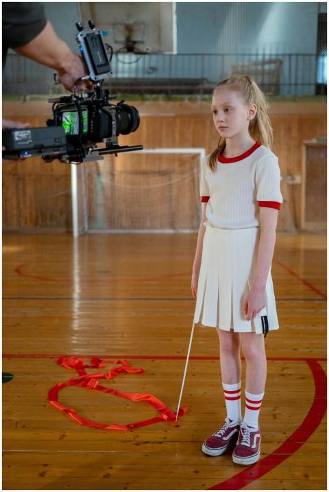 Girl with ribbon prepares for rhythmic gymnastics