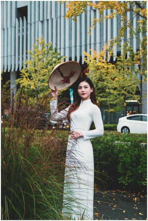 Woman Traditional Dress Holding