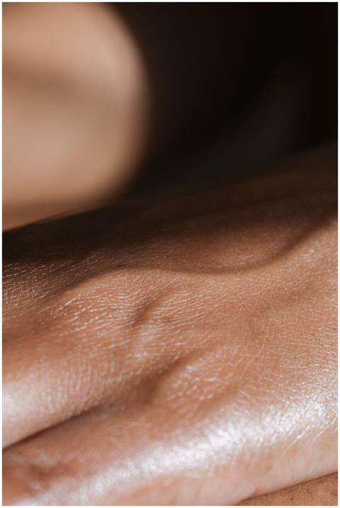 Detailed close-up of human skin texture showing fi