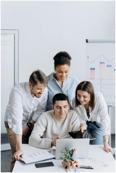 A diverse group of coworkers collaborating on a pr