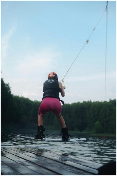 Person Wakeboarding Lake Sunset