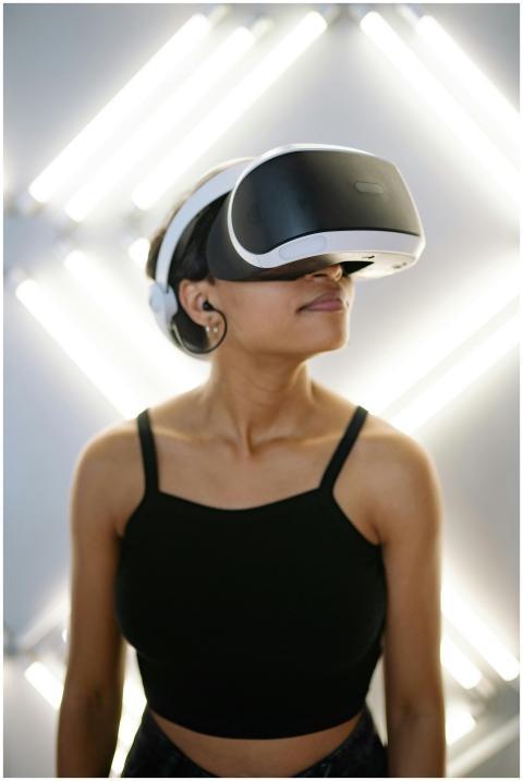 A woman wearing a VR headset immersed in a virtual