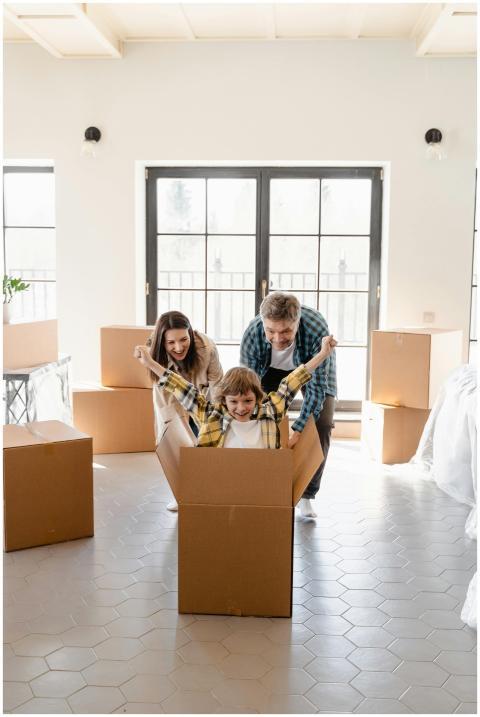 Happy family celebrating move into new home with u