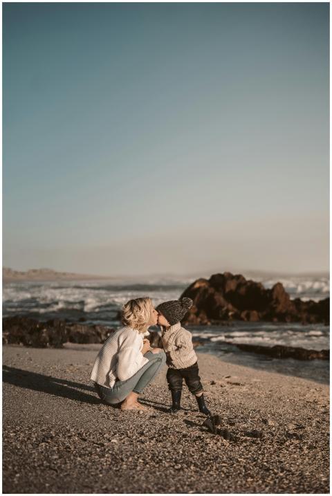 A touching scene of a mother and child sharing a k