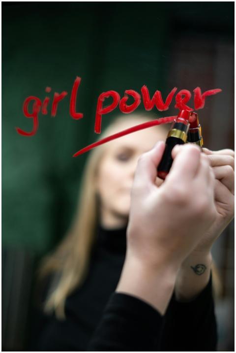Close-up of 'girl power' written with lipstick on