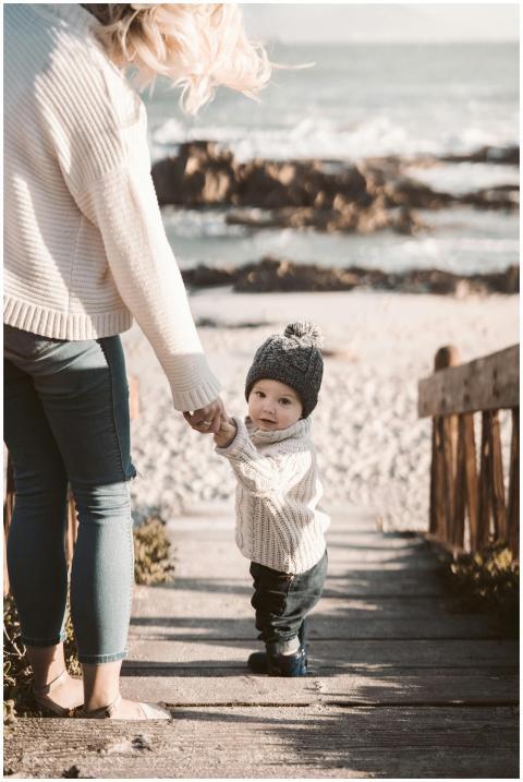 A tender moment between a mother and child on a su