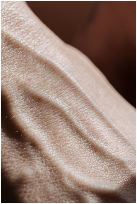 Intimate close-up of human skin highlighting textu