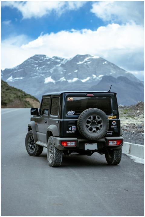 4x4 vehicle on a scenic mountain road in Canta, Pe