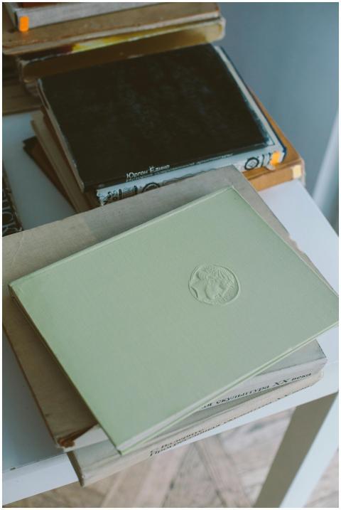 Close-up of a stack of vintage hardcover books on