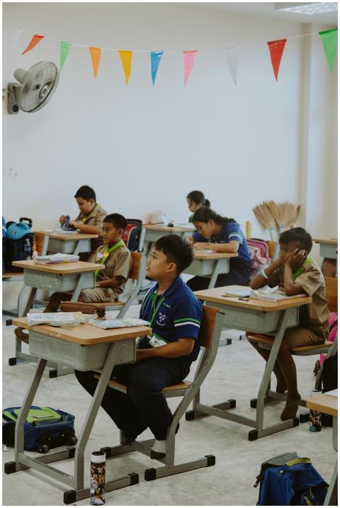 Children focusing on a lesson in a well-organized