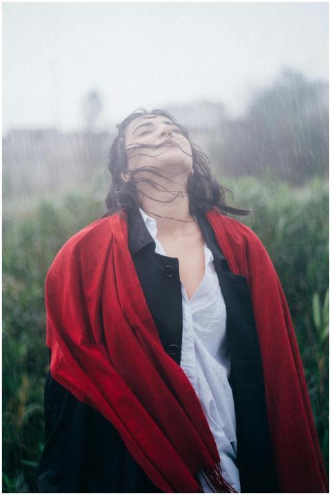 Portrait of a woman with closed eyes and long hair
