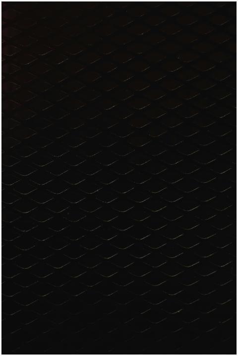 Intricate vertical wire mesh pattern with dark ton