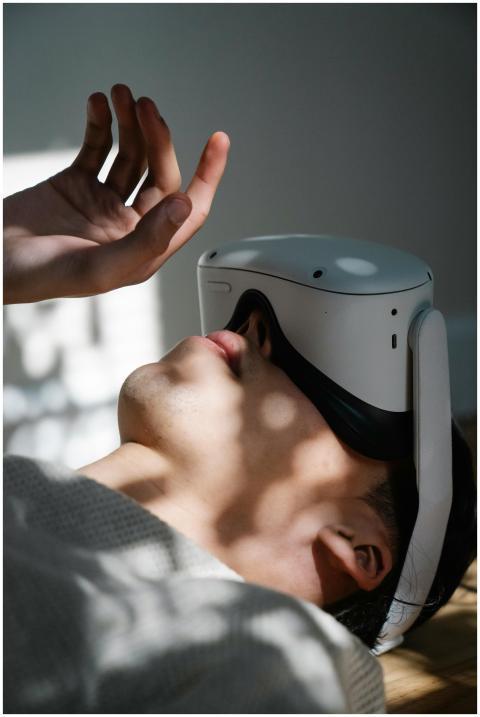 Person using a VR headset while lying down, explor
