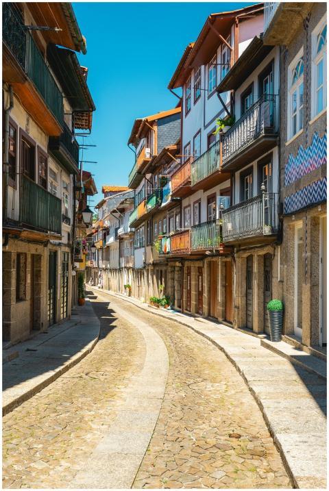 Explore the historic architecture of a cobblestone