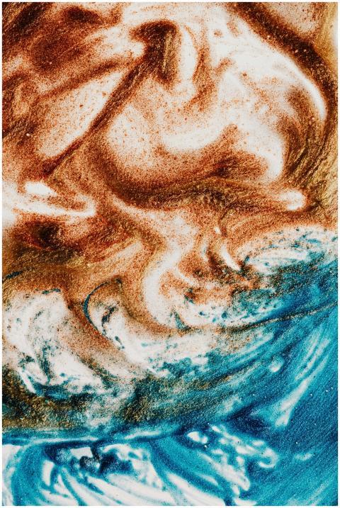 Abstract art featuring swirling patterns in blue a